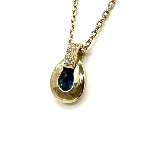 bijou occasion or jaune 750 millièmes 18 carats bijouterie frot pendentif saphir diamants guilde